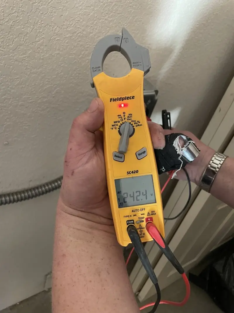 Voltage testing with clamp meter during Generator Installation in Morgan City